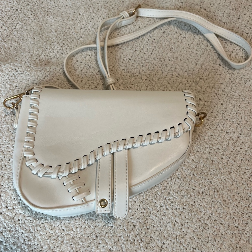 Francesca’s white cross body bag